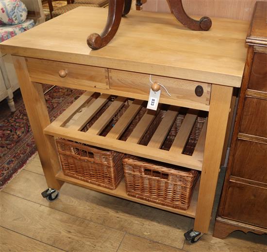 A beech framed butchers kitchen trolley, fitted two drawers and two baskets W.90cm